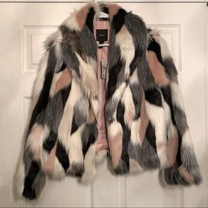 Black, pink, cream faux fur coat